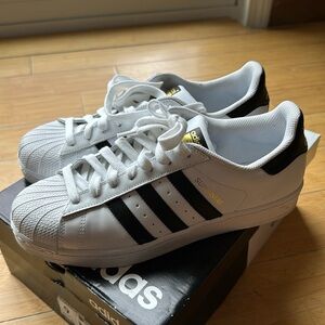 Black Adidas Superstars